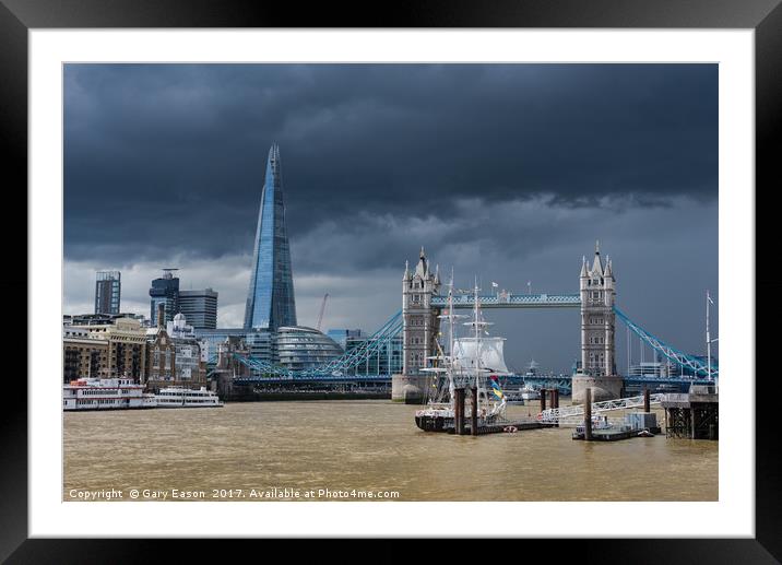 Storm looming over The Shard and Tower Bridge Framed Mounted Print by Gary Eason