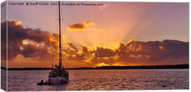 Sunrise rays boat and sea. Canvas Print by Geoff Childs