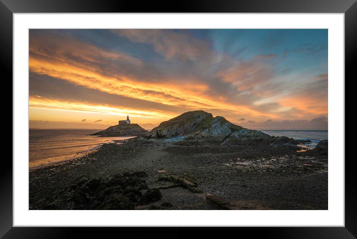 Sunrise at Mumbles lighthouse with the tide going  Framed Mounted Print by Bryn Morgan