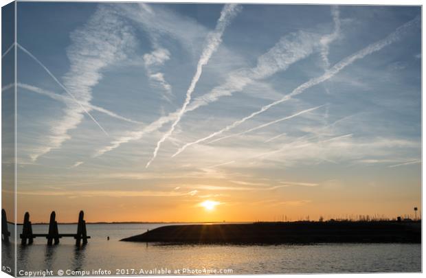 sunset over the harbor Canvas Print by Chris Willemsen