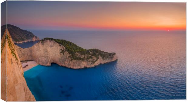 Navagio Beach - Shipwreck Cove at sunset Canvas Print by Kelvin Trundle