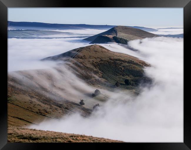 Clouds pouring over the ridge at Mam Tor during an Framed Print by Chantal Cooper