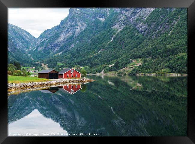 red wooden house at norway fjord Framed Print by Chris Willemsen