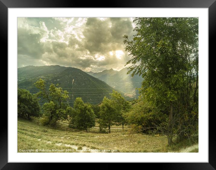 Light and shadow over the mountains Framed Mounted Print by Fabrizio Malisan