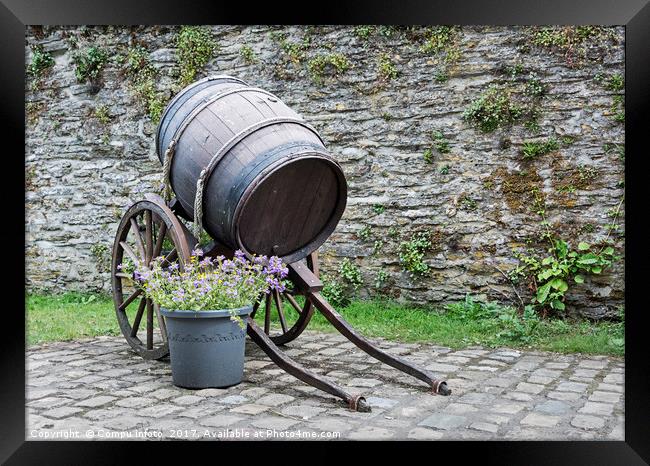 old wine barrel with wheels  Framed Print by Chris Willemsen