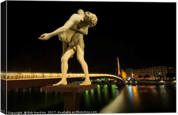 Lyon Bridge Statue by night  Canvas Print by Rob Hawkins