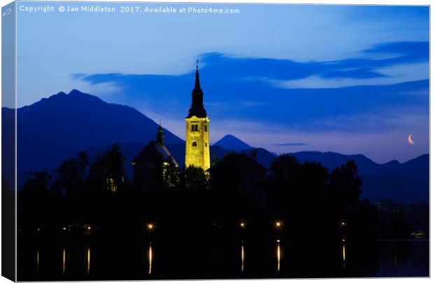 Dawn breaks over Lake Bled Canvas Print by Ian Middleton