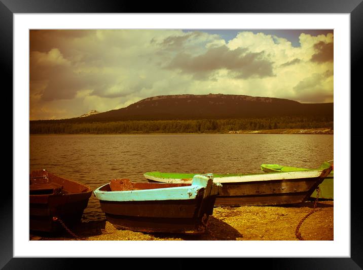 Boats on a lake Framed Mounted Print by Larisa Siverina