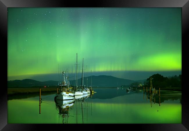 Boats and the southern lights Framed Print by Matthew Burniston
