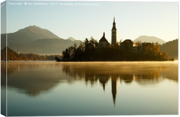 Morning light at Lake Bled Canvas Print by Ian Middleton
