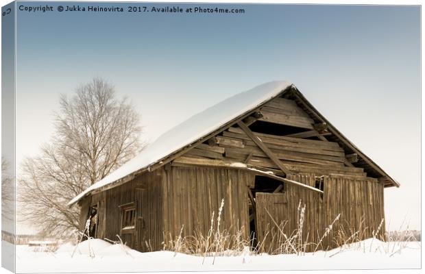 Snow Covered Barn House Canvas Print by Jukka Heinovirta