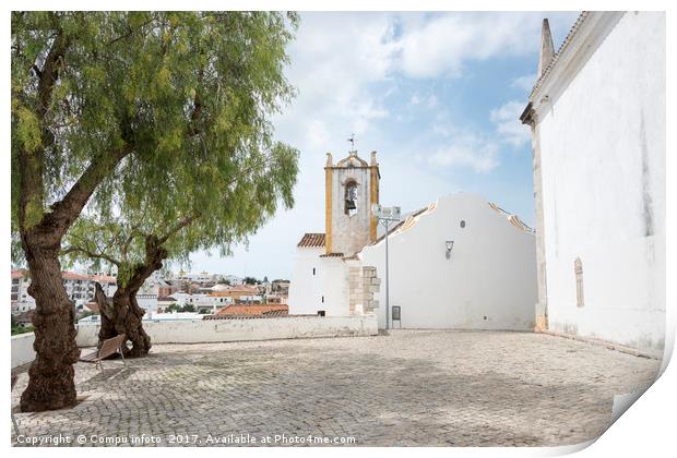 olive trees and church in tavira Print by Chris Willemsen
