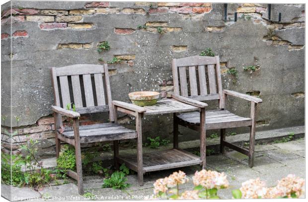 Terrace with wooden Seats and table Canvas Print by Chris Willemsen