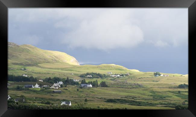 Light and Shadow Falling on the Houses of Portree Framed Print by Maarten D'Haese