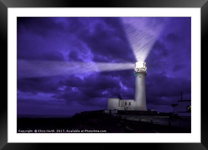 Flambrough Head Lighthouse, a dark and stormy nigh Framed Mounted Print by Chris North