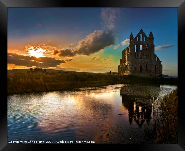 Sunset over Saint Hilda's Abbey, Whitby. Framed Print by Chris North