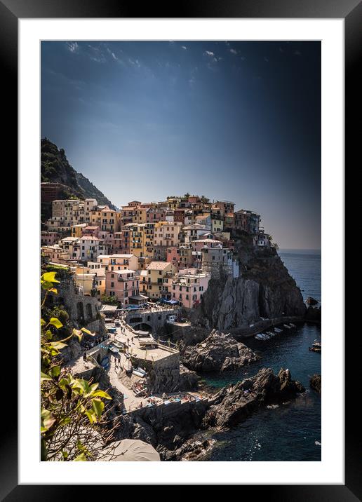 Perched atop the rock Framed Mounted Print by Julian Bowdidge