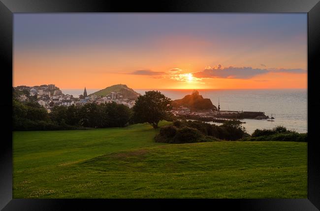 Sunset over the town of Ilfracombe in Devon at sun Framed Print by Steve Heap