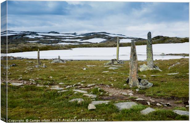 piles of stones as a monument on road 55 Canvas Print by Chris Willemsen