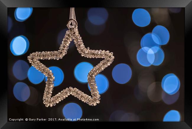 Silver Star at Christmas, against a soft focus Framed Print by Gary Parker