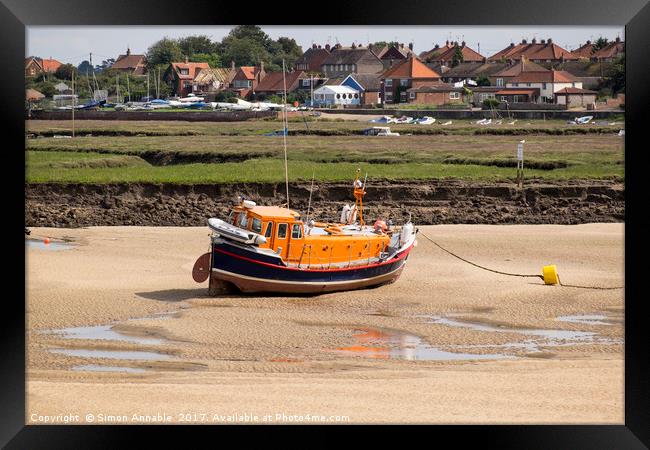 Stranded Lifeboat Framed Print by Simon Annable