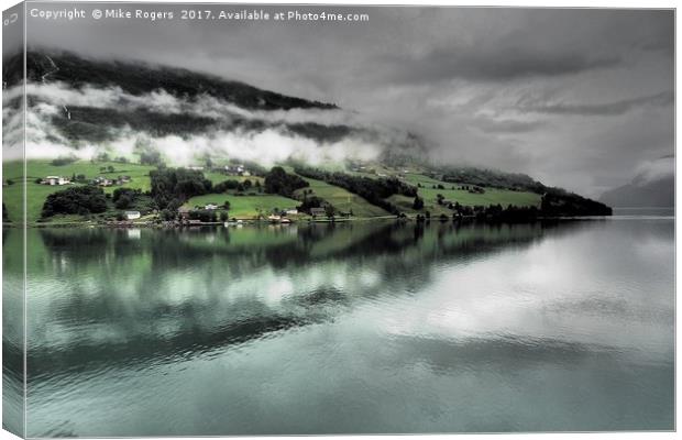 Early morning in the Norwegian fjords              Canvas Print by Mike Rogers