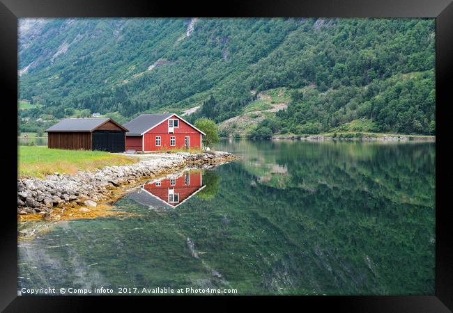 red wooden house at norway fjord Framed Print by Chris Willemsen