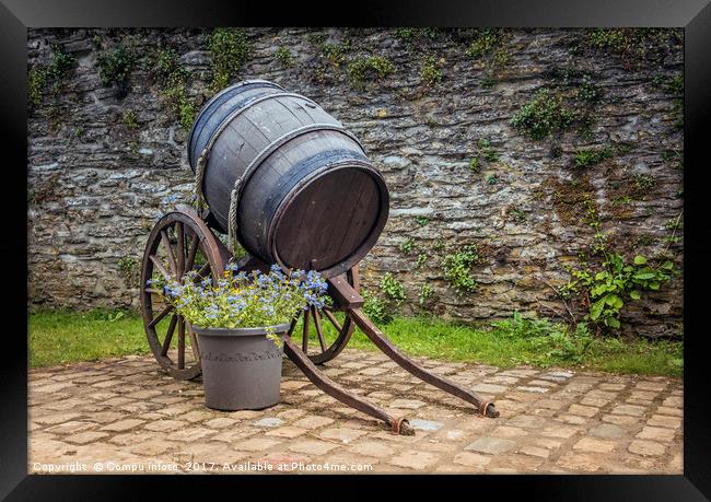 old wine barrel with wheels  Framed Print by Chris Willemsen