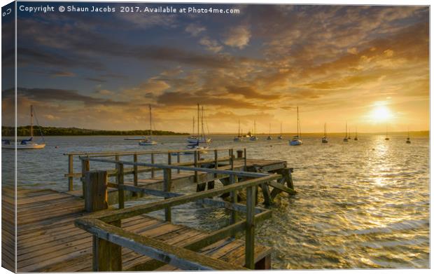 Sunset over Lake pier  Canvas Print by Shaun Jacobs