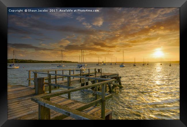 Sunset over Lake pier  Framed Print by Shaun Jacobs
