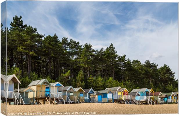 Beach huts by the pine forest Canvas Print by Jason Wells