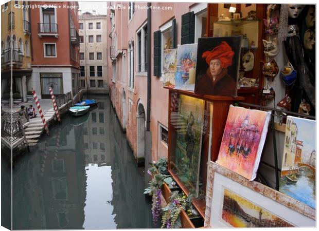 Art on a Venice canal                              Canvas Print by Mike Rogers