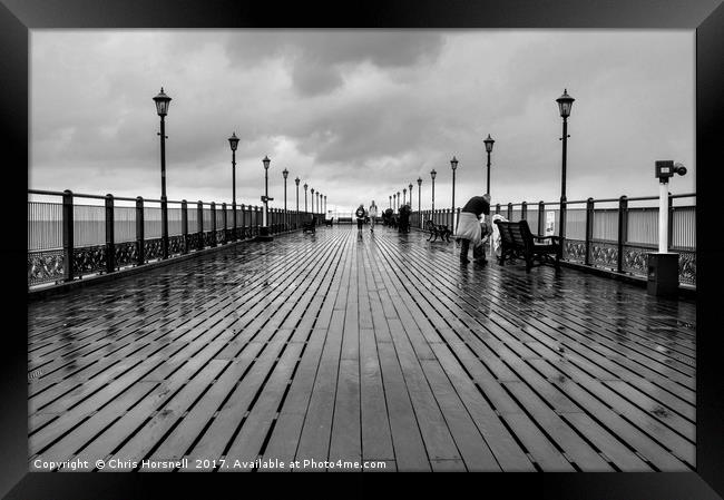 Rainy Pier Framed Print by Chris Horsnell