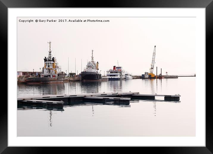 pilot boats against a harbor wall  Framed Mounted Print by Gary Parker