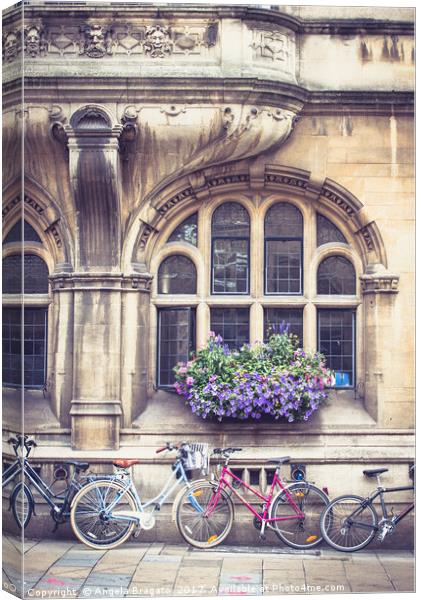 Bicycles in Oxford Canvas Print by Angela Bragato