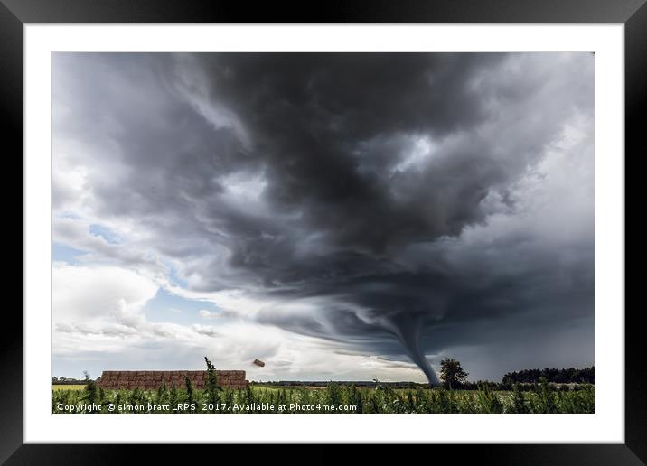 Storm tornado or twister lifting hay bales in stor Framed Mounted Print by Simon Bratt LRPS