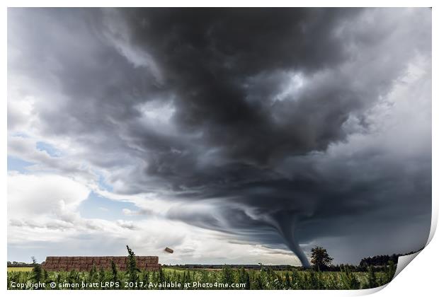 Storm tornado or twister lifting hay bales in stor Print by Simon Bratt LRPS