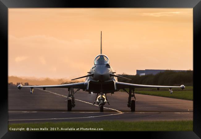 RAF Typhoon taxis out at sunset Framed Print by Jason Wells
