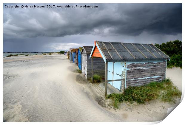 Beach Huts Under A Stormy Sky Print by Helen Hotson