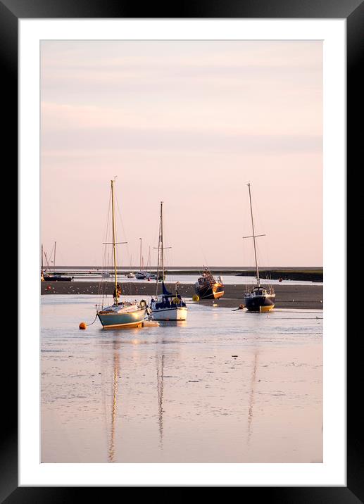 Pink glow in the early morning sky Framed Mounted Print by Simon Annable