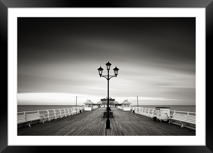 End of the Day - Cromer Pier Framed Mounted Print by Simon Wrigglesworth