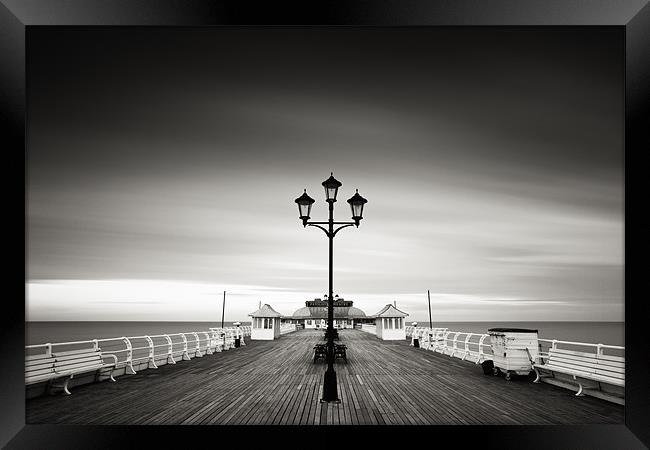 End of the Day - Cromer Pier Framed Print by Simon Wrigglesworth