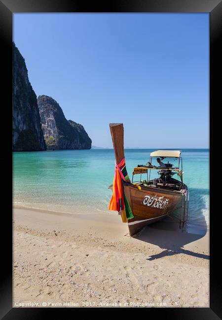 Long tail boat on white sand beach Framed Print by Kevin Hellon