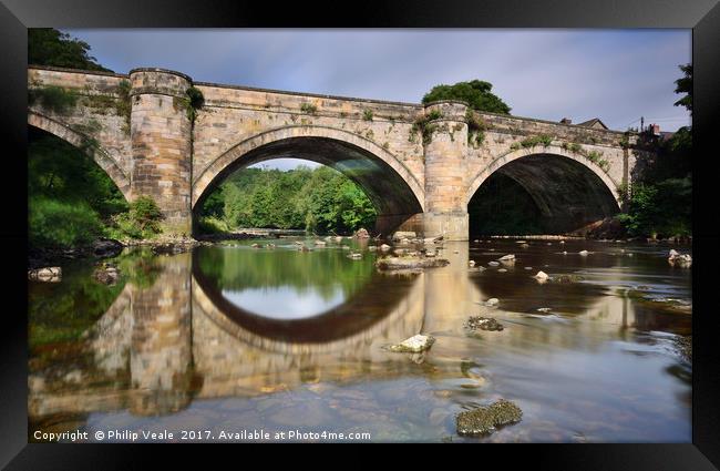 Richmond Bridge Reflection in River Swale. Framed Print by Philip Veale