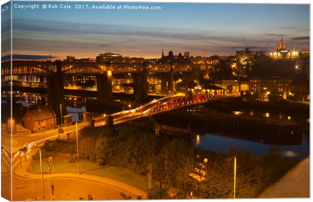 Illuminated Bridges over Tyne Canvas Print by Rob Cole