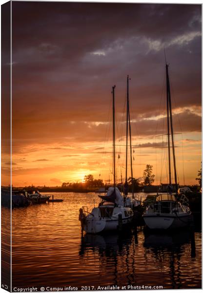 sunset in the harbor of de veenhoop in holland Canvas Print by Chris Willemsen