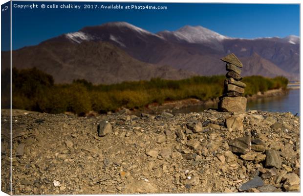 Standing stones in Tibet Canvas Print by colin chalkley