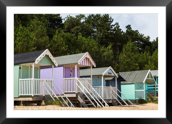Colourful beach huts Framed Mounted Print by Jason Wells