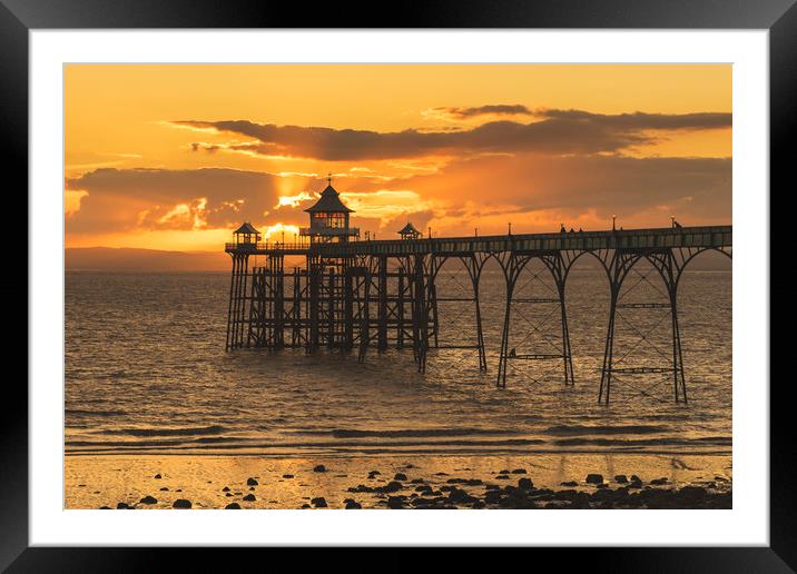 Sun setting at Clevedon Pier Framed Mounted Print by Dean Merry