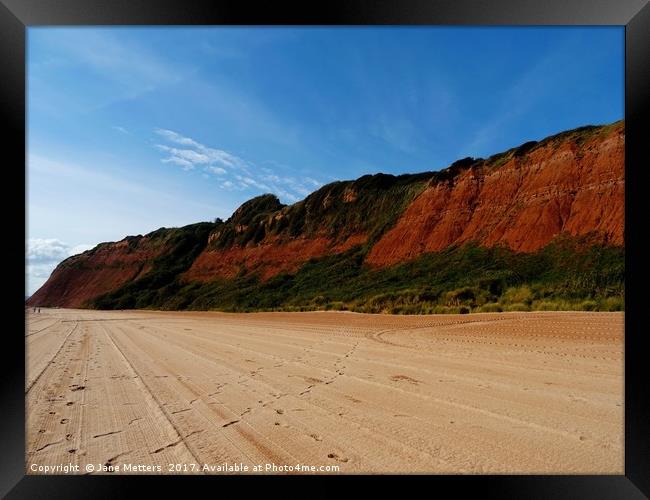    The Red Cliffs of Devon                         Framed Print by Jane Metters